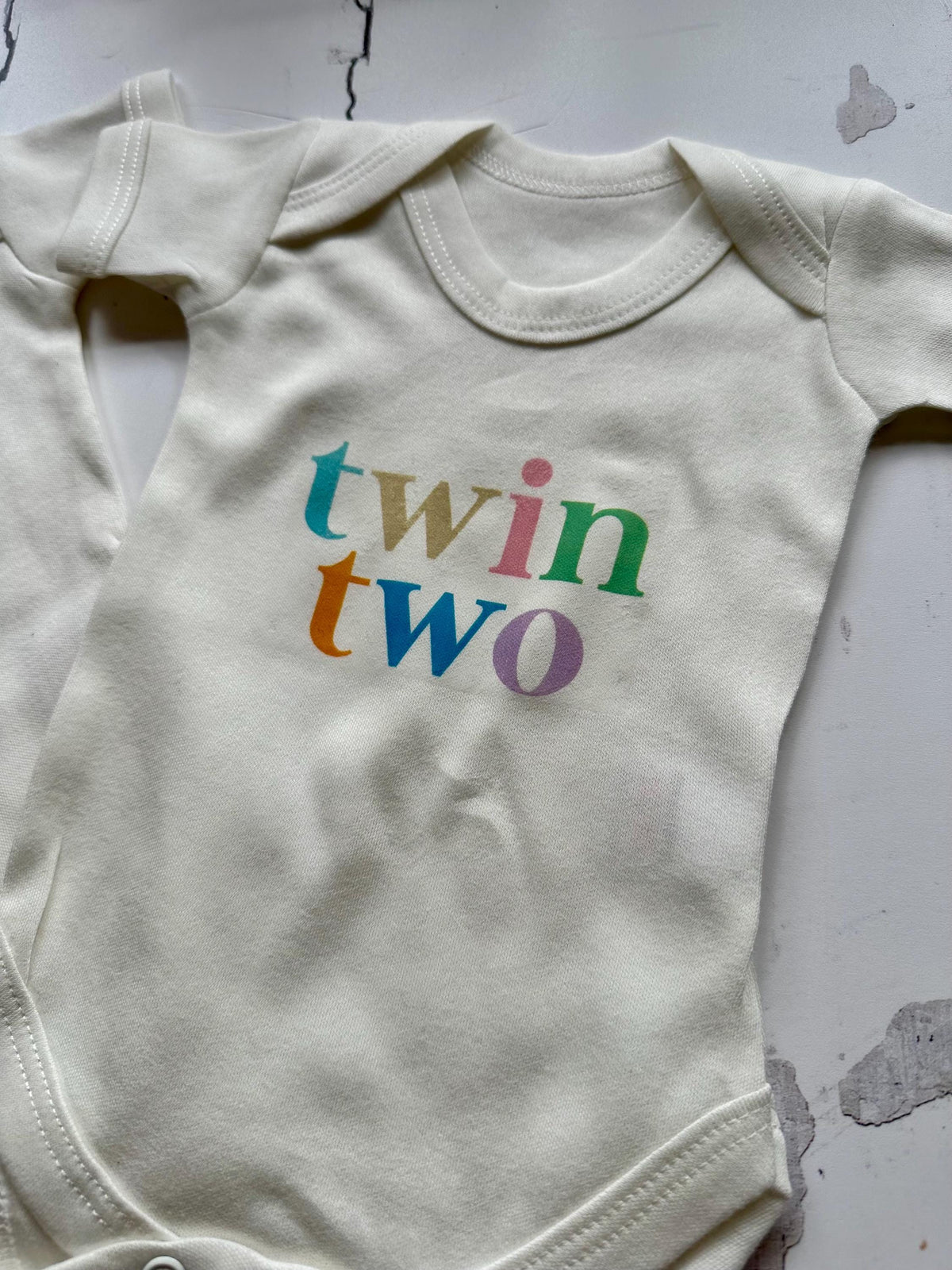 Twin One Twin Two Baby Vest Set: Pastel Rainbow Cotton Onesies
